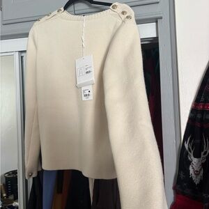 CHANEL Cream Sweater with Gold Button Accents